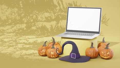linterna de halloween jack calabazas con portátil abierto con pantalla blanca espacio vacío