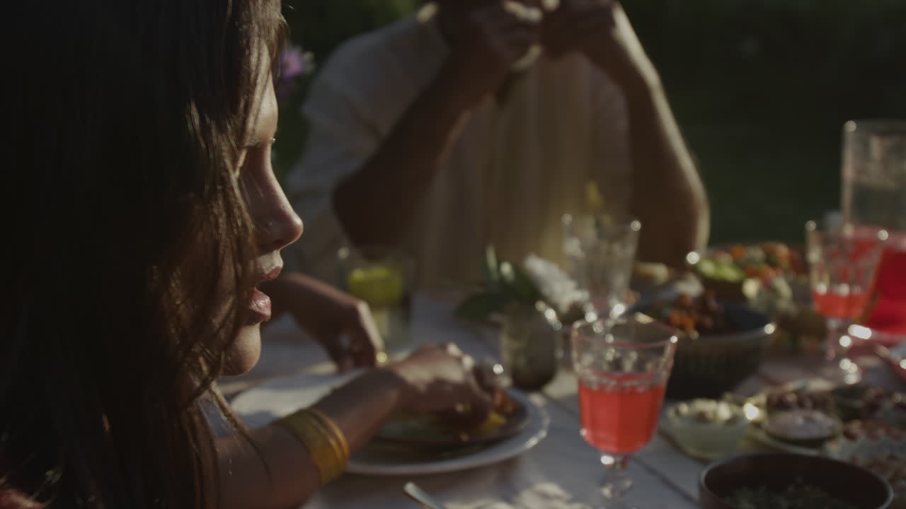 People enjoying an outdoor meal together