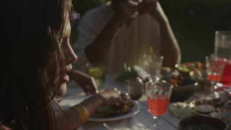 people enjoying an outdoor meal together