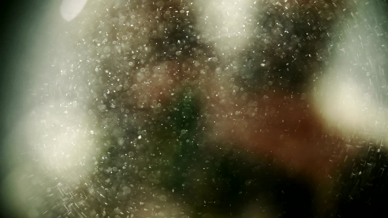 partículas flotantes en movimiento lento