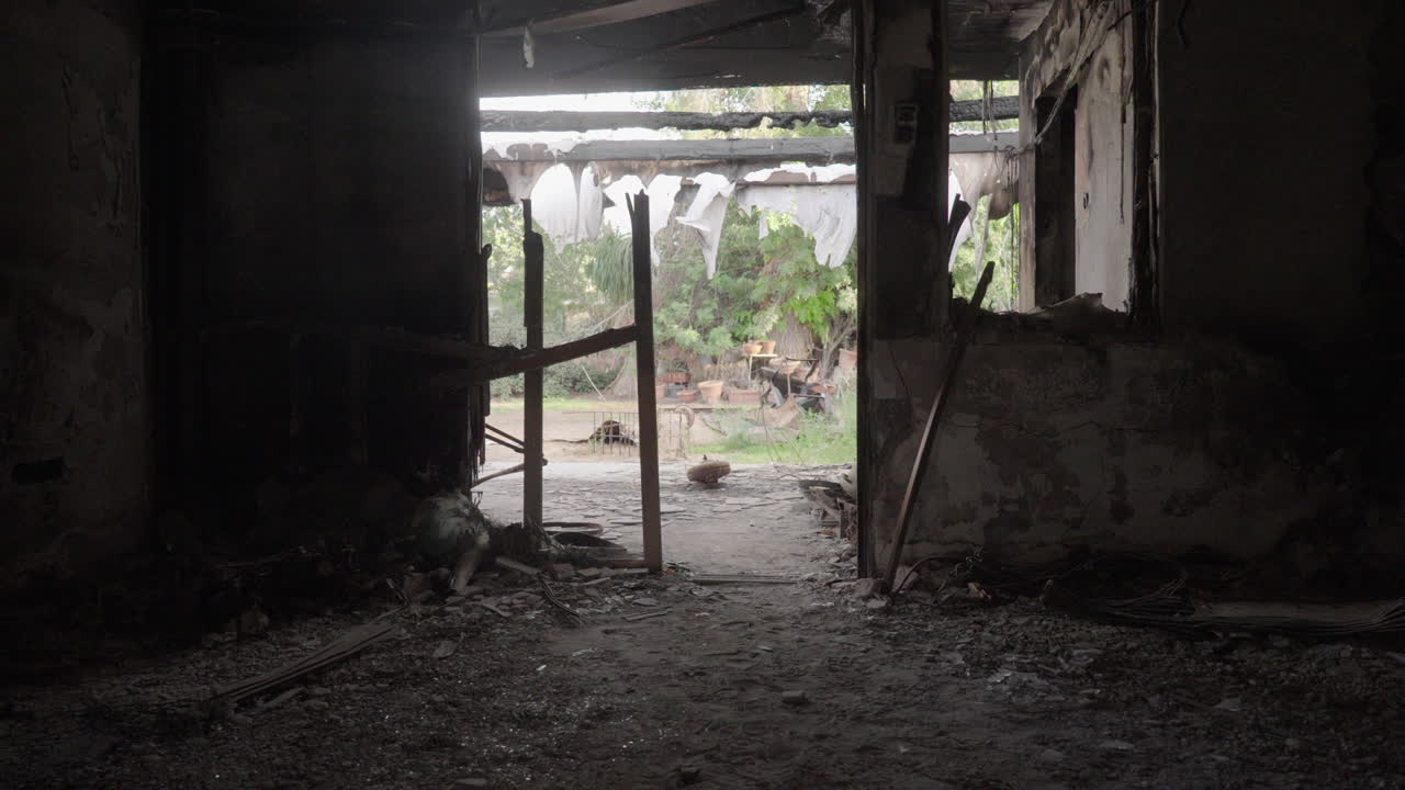 Slow motion of a destroyed home in Kibbutz Nir Oz, Israel after Hamas attack in October 7th