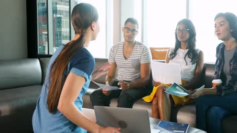 business colleagues discussing over laptop 4k