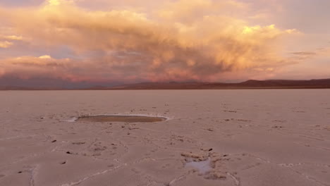 Aerial---Salinas-Grandes-Salt-Flats,-Jujuy,-Argentina,-Wide-Shot-Backward