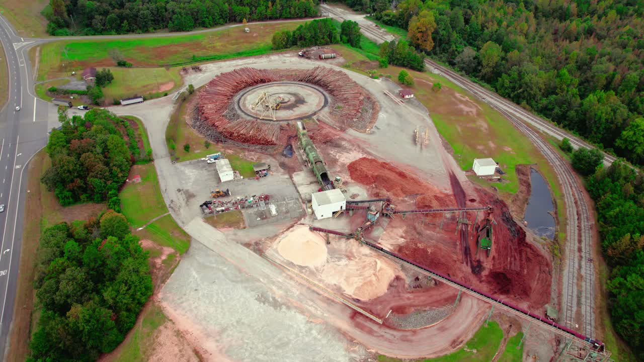 Aerial Fly-over a large chip mill facility in Brent, Alabama