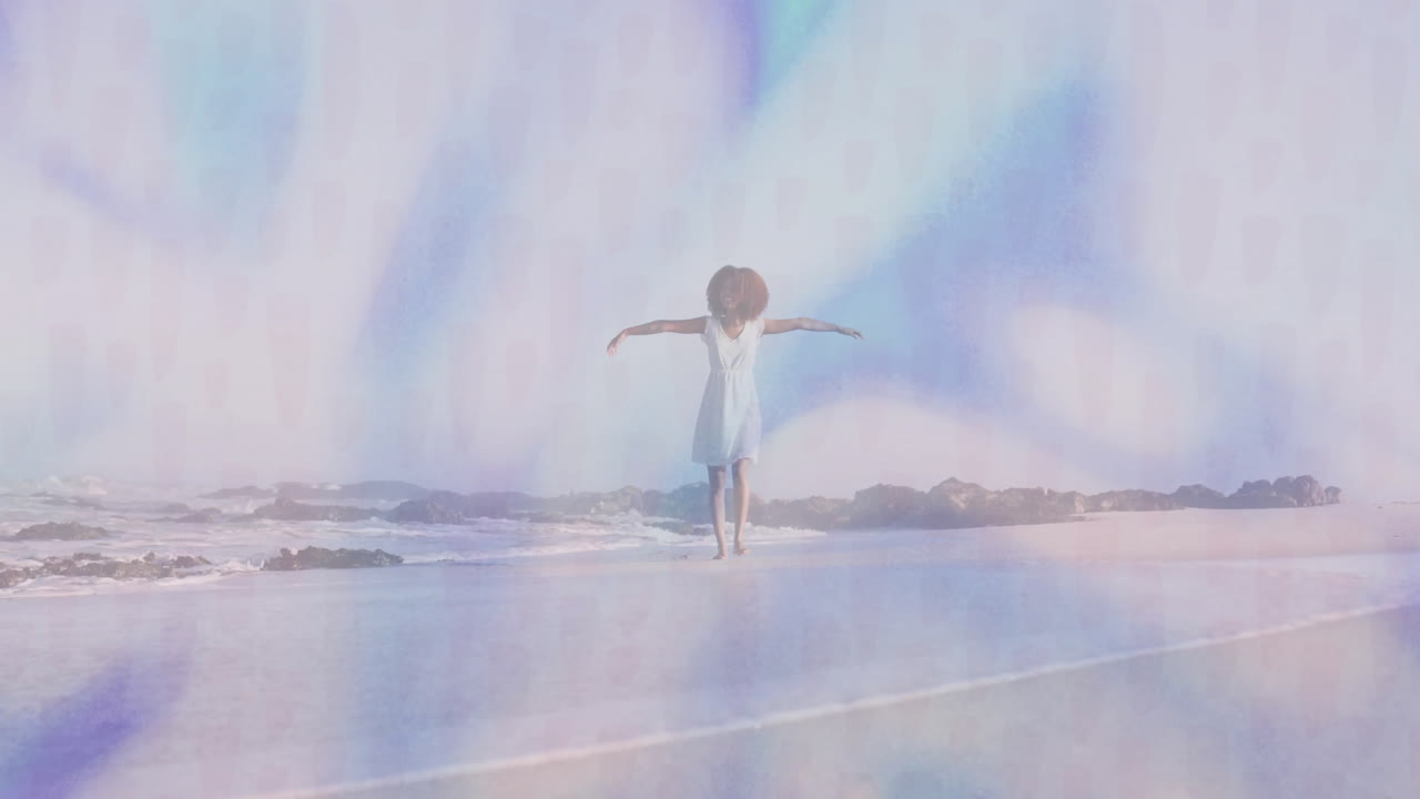 Balancing on beach, woman in white dress with abstract blue animation overlay