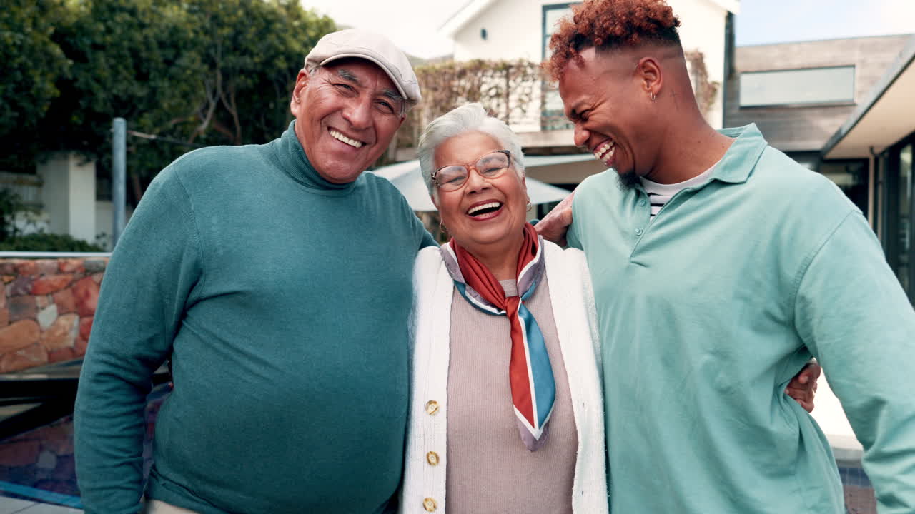 Three Happy Generations of Family Smiling Together Outdoors