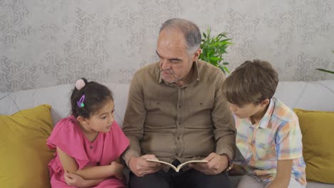 grandpa reading to his grandchildren.