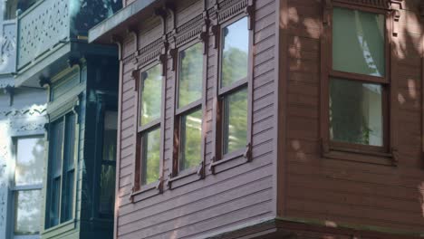 old house facade with detailed wooden windows