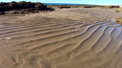 La-Arena-Dirige-El-Agua-De-La-Marea-Baja-De-Regreso-Al-Mar,-Puerto-Peñasco,-Golfo-De-California,-México