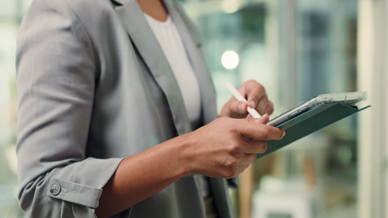 Woman using a tablet in an office setting