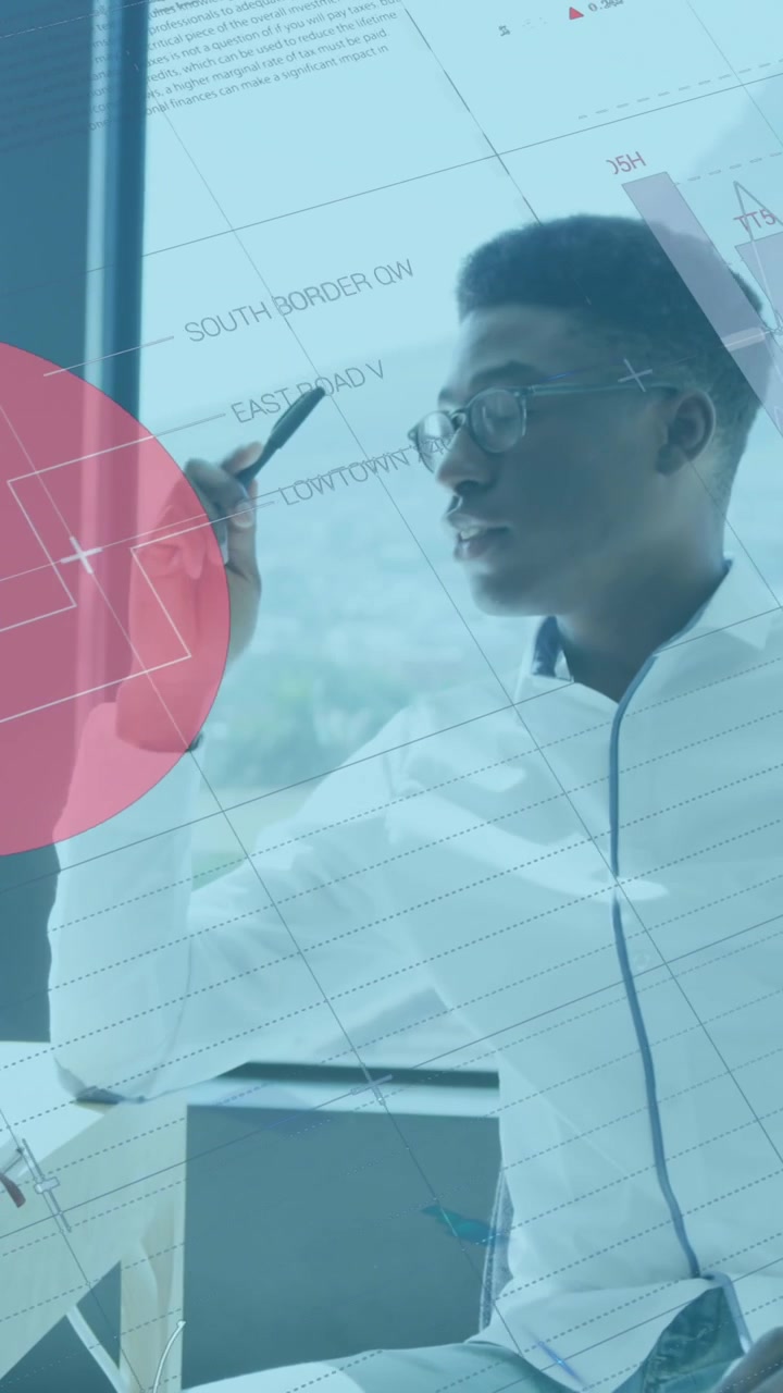 Animation of data processing over african american businessman working in office