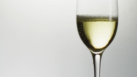 Champagne-glass-on-white-background-at-new-year's-eve