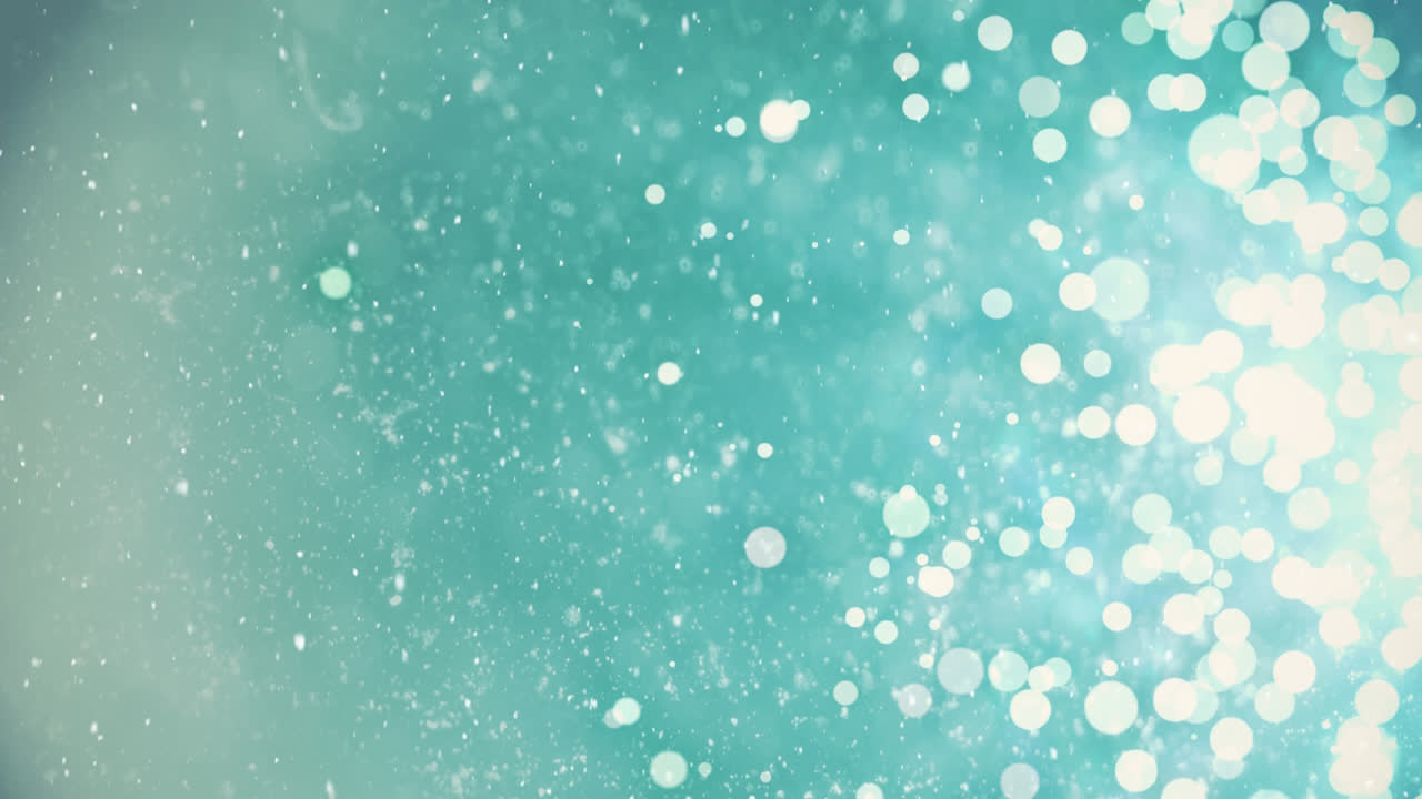 la nieve cayendo con chispas de luz navideña