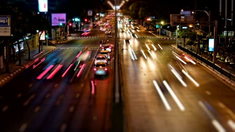 timelaps night, traffic on the roads of the city, many cars in the big city