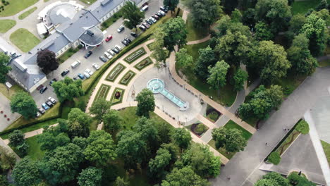 Popular-Druskininkai-resort-hotel-with-majestic-fountain,-aerial-drone-view