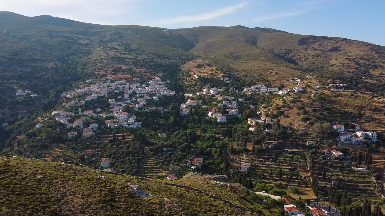Aerial Orbit of Stenies Slope Village in Andros, Greece