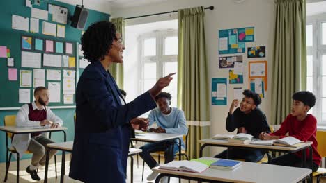 teacher leading a class in a diverse classroom