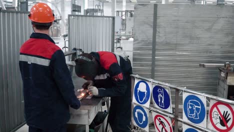 welding operation in an industrial factory