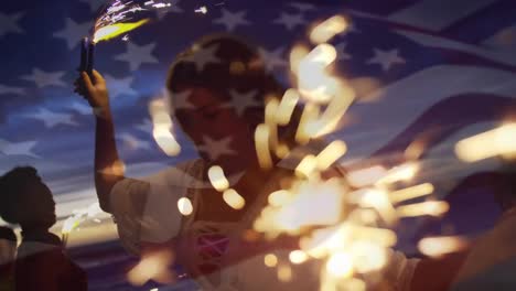 animación de ondear la bandera de ee.uu. sobre un grupo de amigos divirtiéndose en la playa