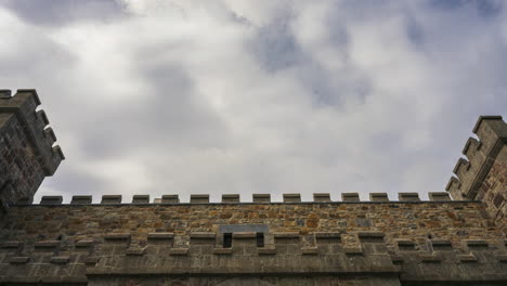 timelapse of local historical castle viewed from the ground on sunny cloudy day in county roscommon in ireland