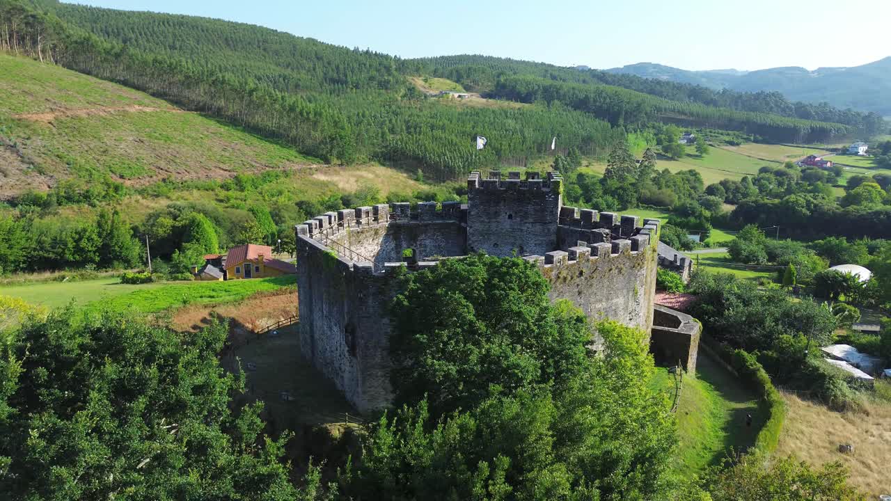 Charming medieval castle in lush Galicia landscape, historic solitude