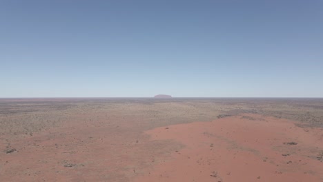 vast desolate desert at red centre - uluru-kata tjuta national park in northern territory, australia. - aerial wide shot