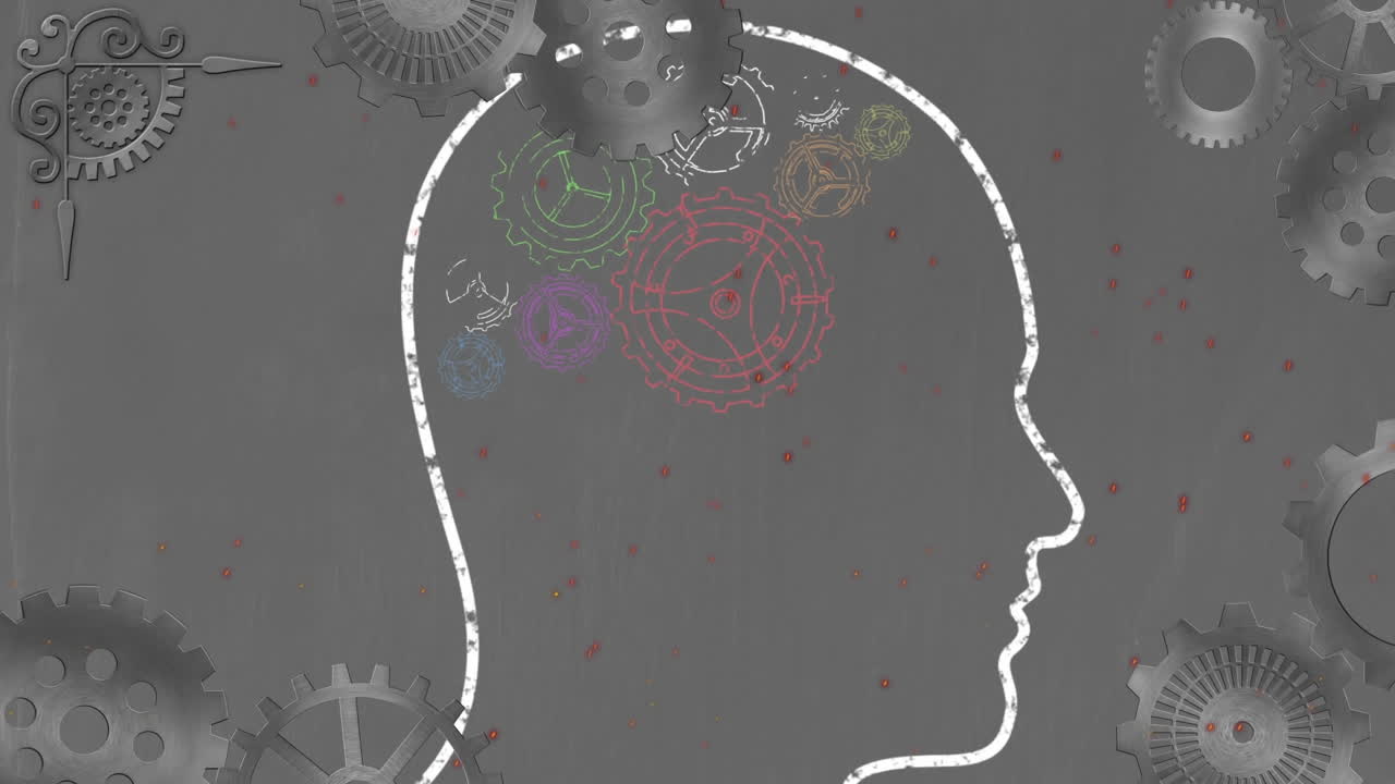 ruedas de engranajes girando sobre la cabeza humana contra un fondo gris