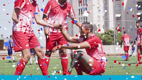 colorful confetti falling against disabled male soccer player helping his teammate to get up