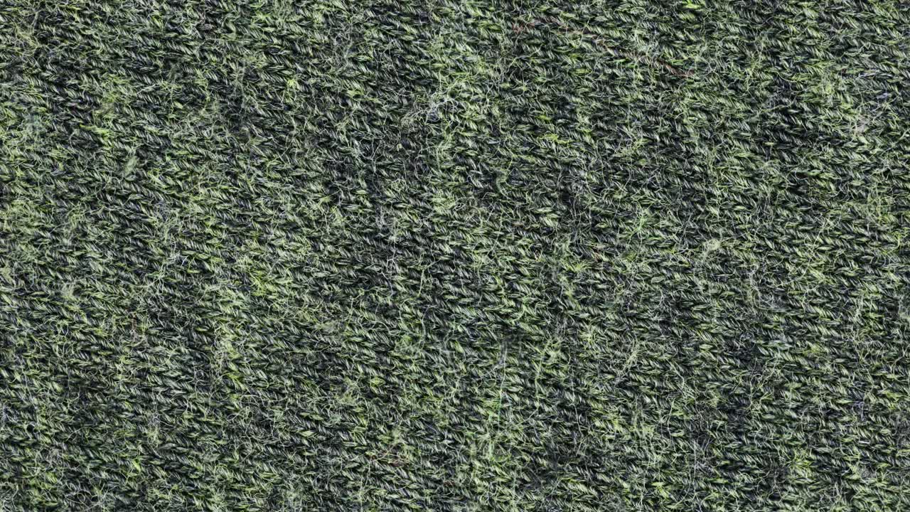 fibra de tejido de lana áspera gira lentamente