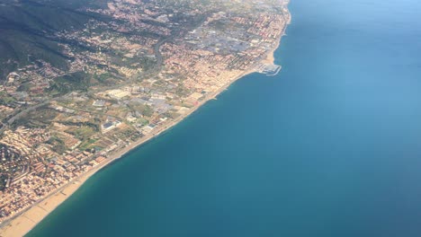 view from a plane of the north east coastline of spain near barcelona