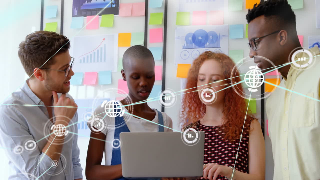 Animation of network of connections with icons over diverse colleagues talking in office