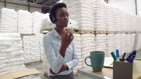 Young-female-male-manager-in-a-warehouse