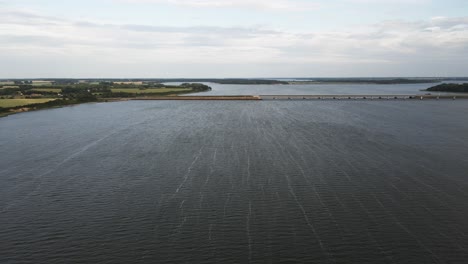 Flying-parallel-to-the-famous-Rügenbrücke,-connecting-Rügen-and-Stralsung-in-Germany