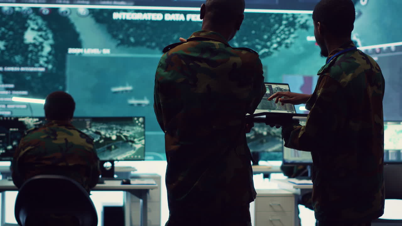 Intelligence analysts supervising and coordinating the big data analysis