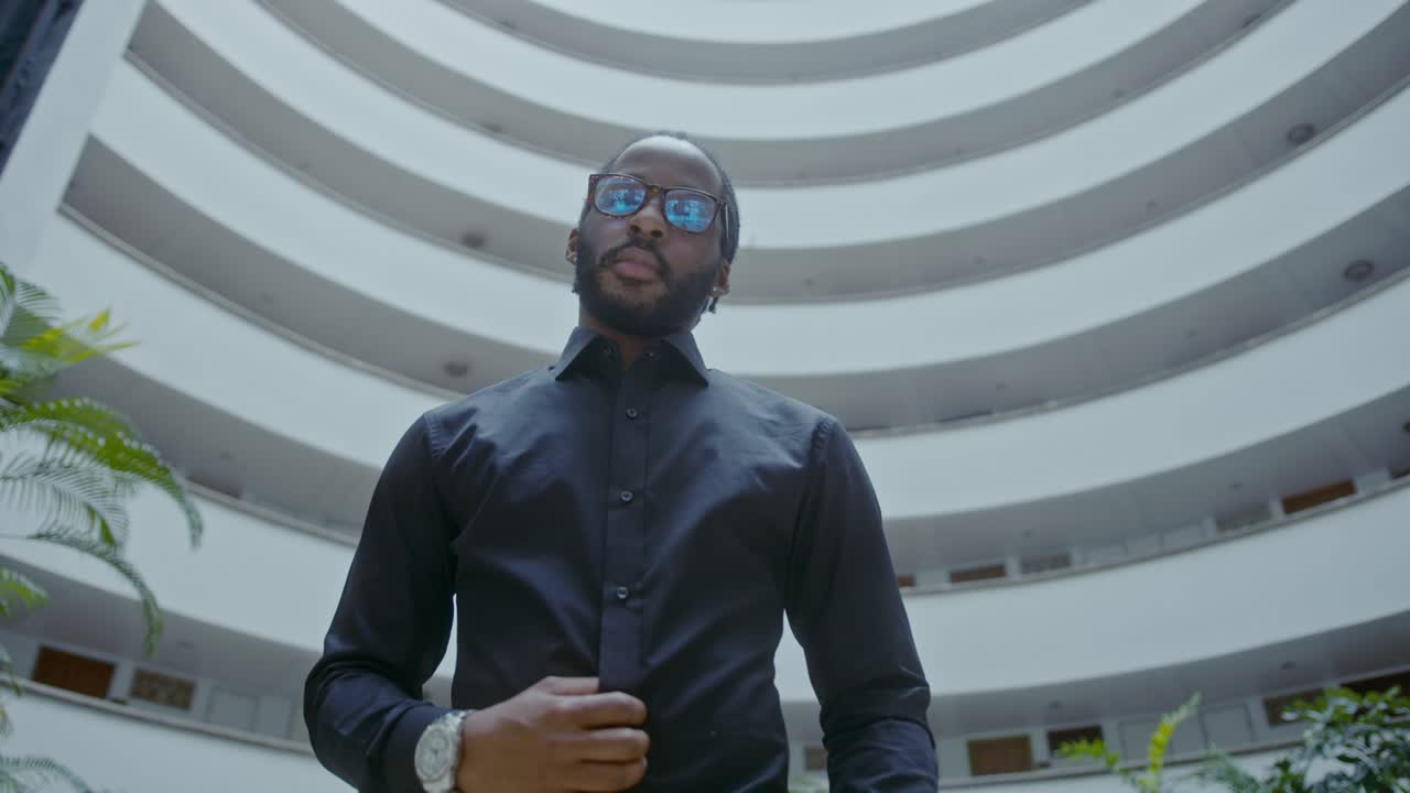 Serious Businessman in Modern Interior