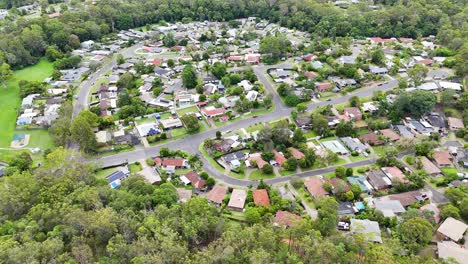 suburban neighborhood surrounded by lush greenery