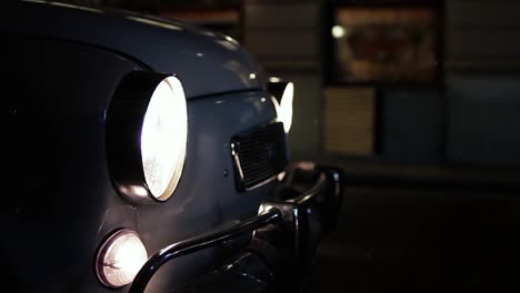 old car parking in the street at night. 4k resolution.