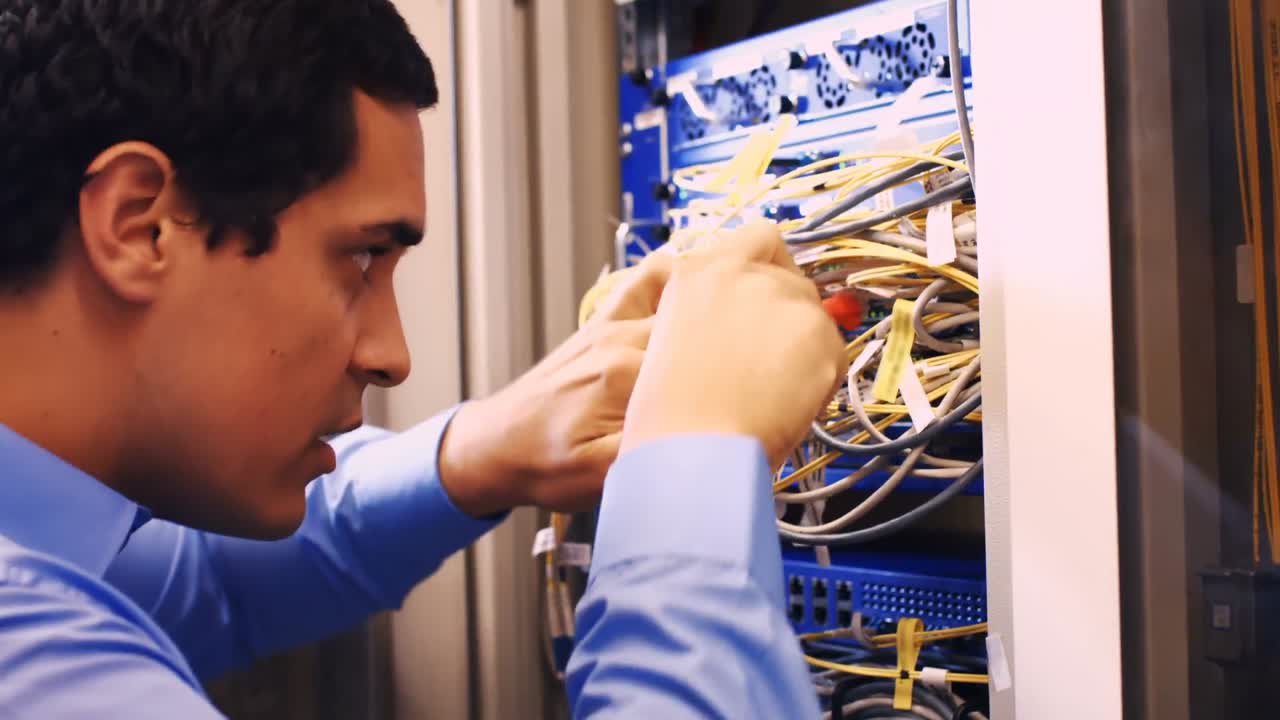 Technician fixing cable