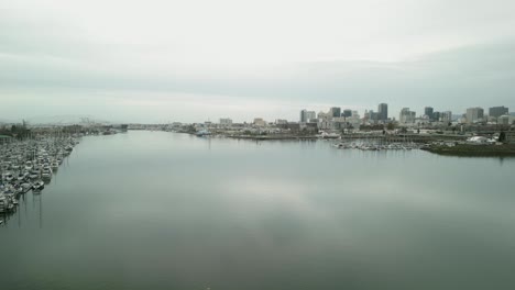 stunning aerial views of jack london square's waterfront, highlighting the dynamic mix of urban and maritime landscapes in oakland.