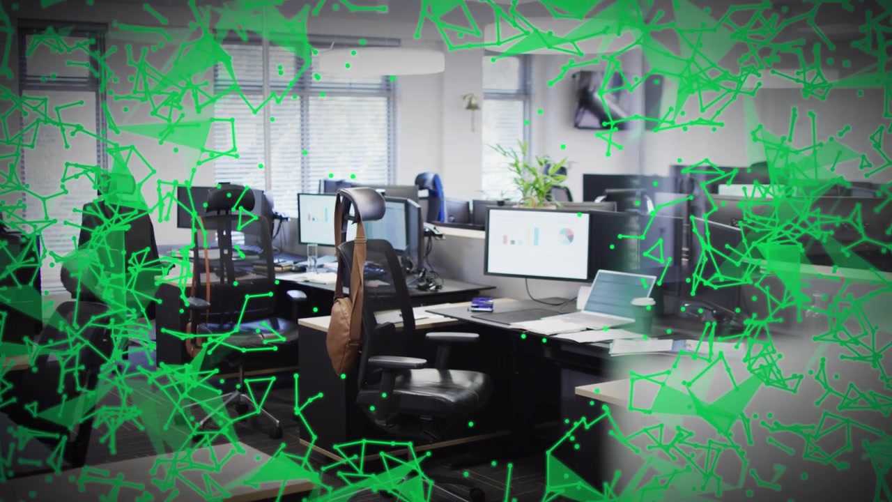 Green overlay appearing at edges and growing inward, camera focusing central desk, showing network