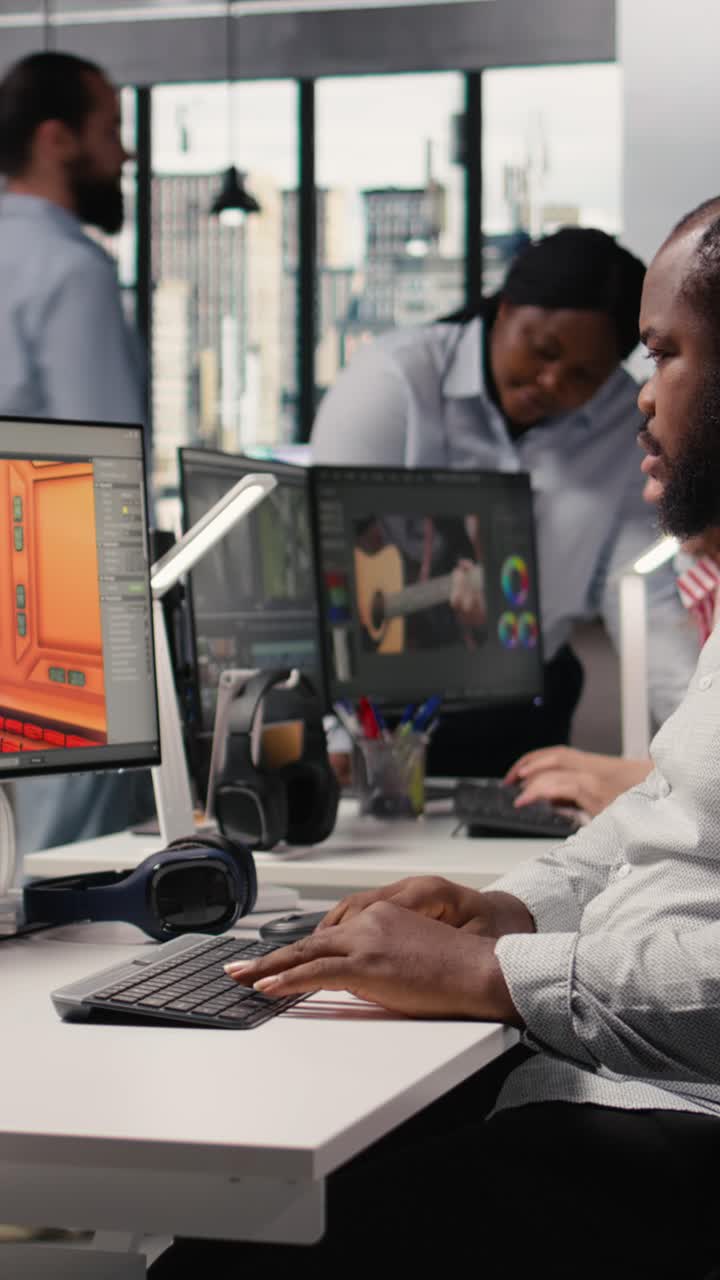 Vertical Video Black Male Game Developer Creating Futuristic Space Video Game