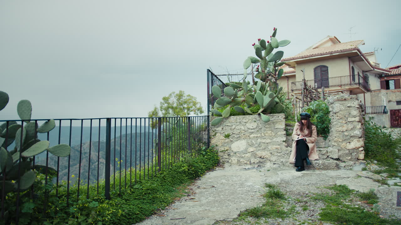 Woman Studying Sitting In The Town Immersed In The Nature