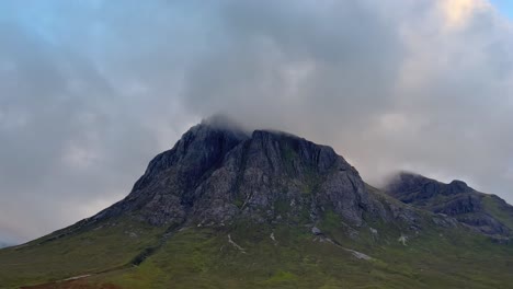 Discovering-the-enigmatic-beauty-of-a-moving-shot-capturing-a-volcanic-rock-in-the-ethereal-landscape-of-the-Scottish-Highlands,-a-geological-wonder