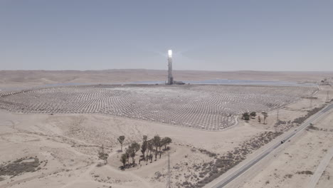 raw file - the enormous ashalim power station that combines 3 kinds of energy, solar, photovoltaic and gas - rising up shot