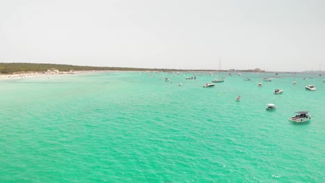 Spain,-Mallorca-Platja-des-Trenc-beach-a-beautiful-fly-by-over-the-beach-at-4k-24-fps-with-ND-filters-on-a-very-bright-day-with-a-DJI-Mavic-Air-drone