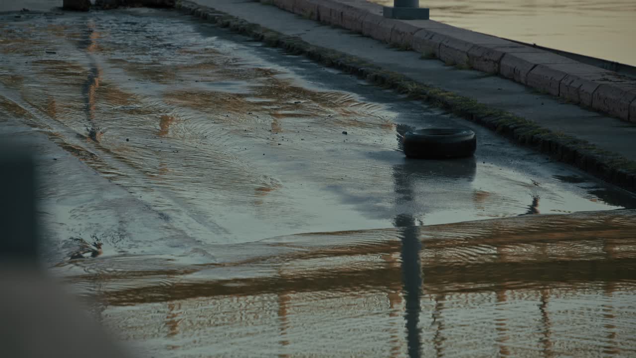 Flooded Road with Tire