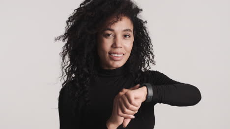 African-american-woman-smiling-over-white-background.