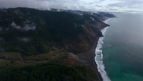 usal beach sinkyone wilderness lost coast trail redwood forest california aerial drone rugged untouched coastline mist morning remote untouched waves crashing bluffs mountainside camping circle left