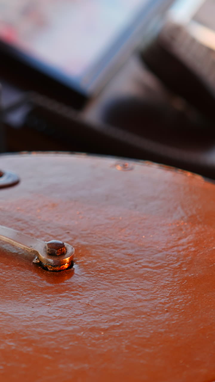 Close-up of a metal surface with a wrench