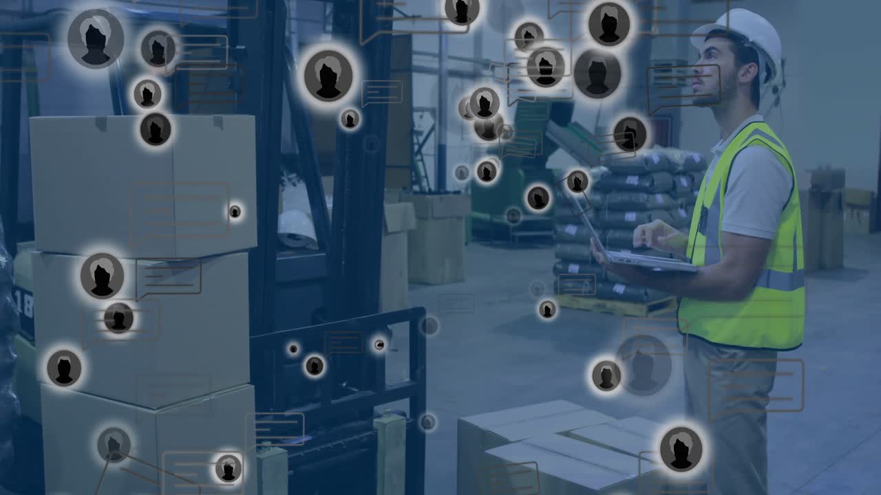 Warehouse operator opening laptop using data icons tracking pallet inventory while forklift lifting